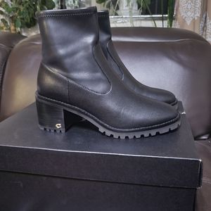 COACH Joy black lug sole chunky stretch  boots